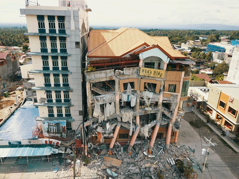 epa07961839 An aerial shot taken with a drone shows a damaged hotel in the aftermath of a 6.5 magnitude earthquake, in Kidapawan city, Cotabato province, Philippines, 31 October 2019. According to the United States Geological Survey (USGS), a 6.5 magnitude earthquake occurred at a depth of 10km near Bulatukan, Cotabato province, on 31 October. It is the third strong earthquake the area has experienced this month.  EPA/CERILO EBRANO