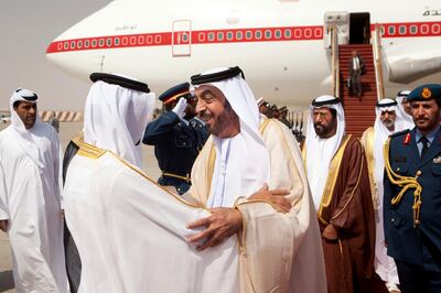 ABU DHABI, UNITED ARAB EMIRATES - September 17, 2010: (center) HH Sheikh Khalifa bin Zayed Al Nahyan President of the UAE and Ruler of Abu Dhabi is received by HH Sheikh Hamdan bin Zayed Al Nahyan, Ruler's Representative in the Western Region and Deputy Prime Minister and  family and friends at Al Ain Airport upon returning from a trip abroad. ( Ryan Carter / Crown Prince Court - Abu Dhabi )