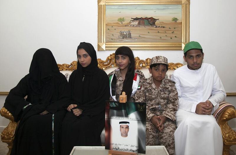 A family united in grief: left to right, widow Umm Majed, 15-year-old daughter Mahra Jamal, second daughter Maha, 13, nine-year-old son Zayed and Mahra’s twin brother Majed. Jeffrey E Biteng / The National