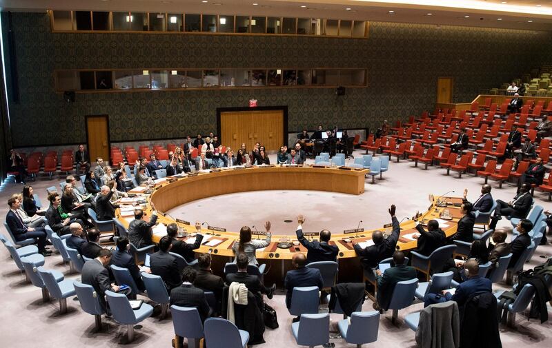 In this photo provided by the United Nations, the U.N. Security Council votes to demand an immediate end to the fighting in South Sudan, Thursday, March 15, 2018 at United Nations headquarters. the U.N. Security Council on Thursday urged the warring parties in Yemen to ensure that humanitarian aid gets to all affected areas, citing U.N. estimates that over 22 million people need food, medicine and other aid.   (Eskinder Debebe/The United Nations via AP)