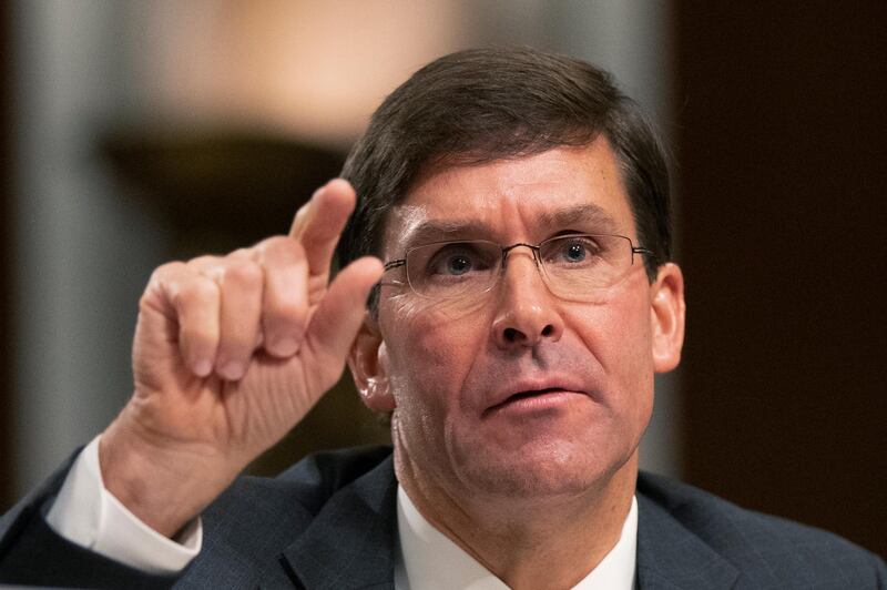 In this July 16, 2019 photo, Secretary of the Army and Secretary of Defense nominee Mark Esper testifies before a Senate Armed Services Committee confirmation hearing on Capitol Hill in Washington. Esper, an Army veteran and former defense industry lobbyist, won Senate confirmation Tuesday to be the Secretary of Defense.    (AP Photo/Manuel Balce Ceneta)