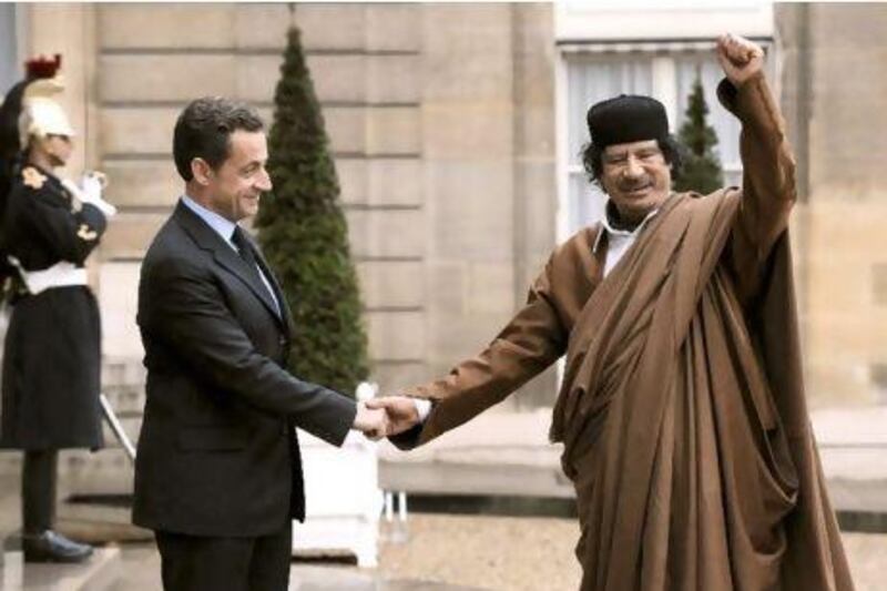 French president Nicolas Sarkozy welcomes Libyan leader Muammar Qaddafi in 2007 at the Elysee Palace in Paris.