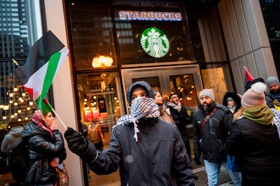 Activists protesting in support of Palestinians at a Starbucks in Chicago, Illinois, in December. Reuters