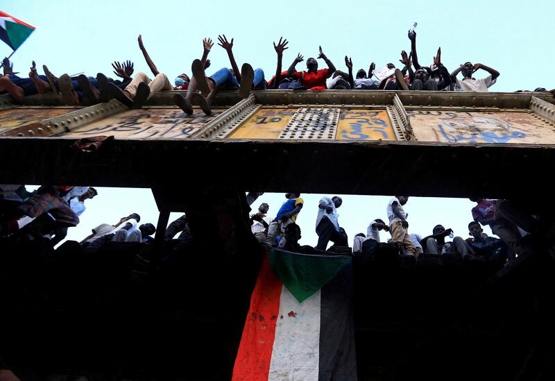 Sudanese protesters attend a demonstration in front of the defence ministry. Reuters