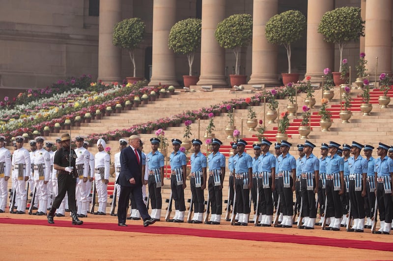 US President Donald Trump reviews a guard of honour during a ceremonial reception at Rashtrapati Bhavan, the Indian Presidential Palace, in New Delhi, India.  AP