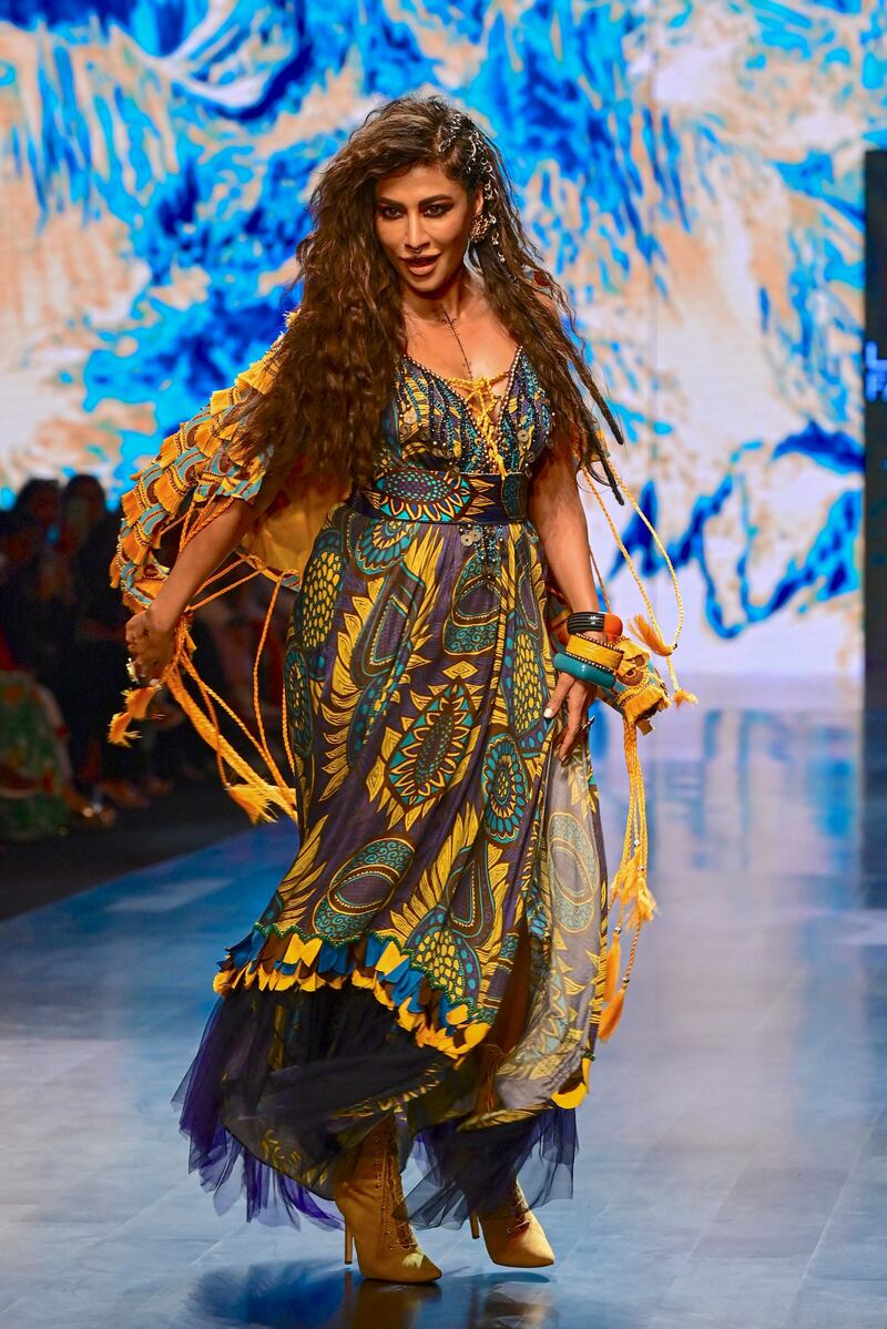 Actress Chitrangada Singh presents a creation by designer Eshaa Amin during the FDCI x Lakme Fashion Week. AFP