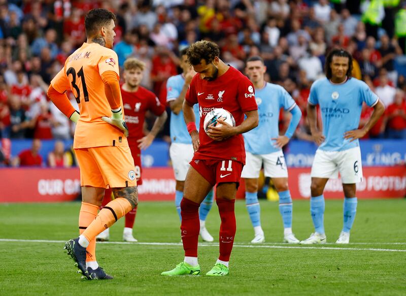 Liverpool's Mohamed Salah prepares to take his penalty. Action Images