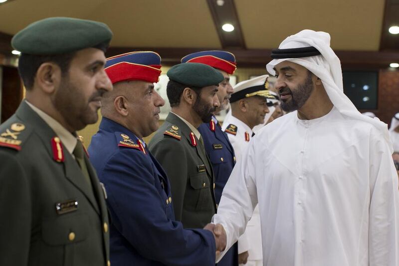 Sheikh Mohammed bin Zayed, Crown Prince of Abu Dhabi and Deputy Supreme Commander of the Armed Forces, greets officers at a reception for representatives of the Ministry of Foreign Affairs, Ministry of Interior and the Armed Forces, at Al Bateen Palace. Ryan Carter / Crown Prince Court – Abu Dhabi