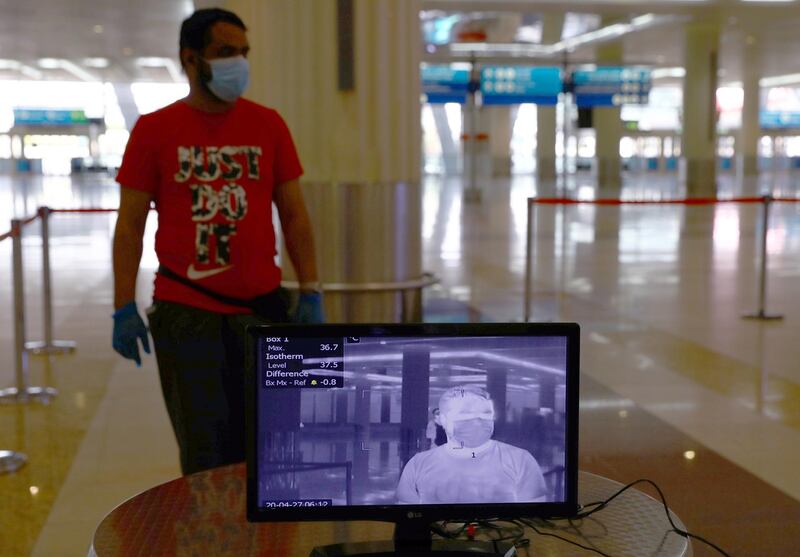 A man is seen through a thermal camera at Dubai International Airport on April 27, 2020, when repatriation flights were the only passenger options. Reuters