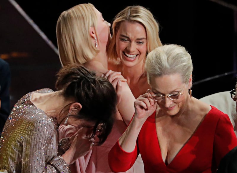 What's going on here? Well, Meryl's clearly just told a zinger and then dropped the mic, walking away. Sally Hawkins, Saoirse Ronan and Margot Robbie are loving it. Reuters