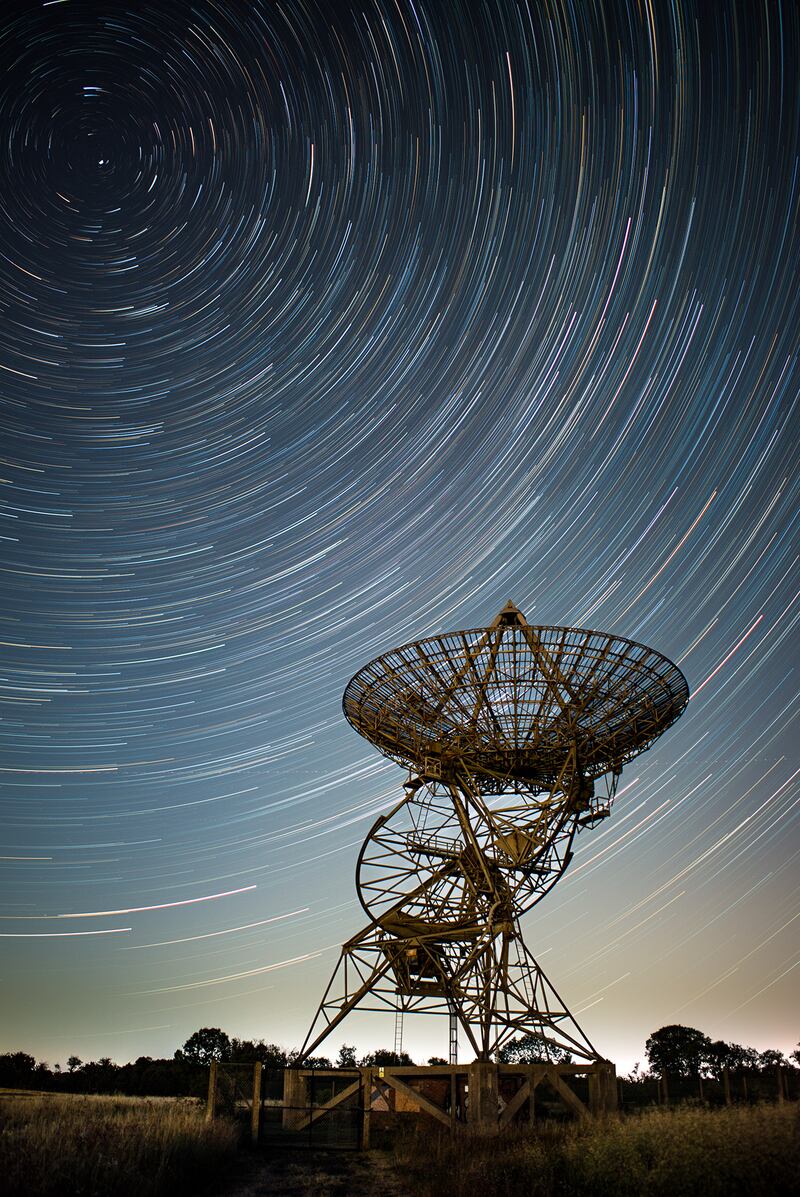 Star trails over a deactivated radio telescope antenna in Cambridge. Photo: João Yordanov Serralheiro