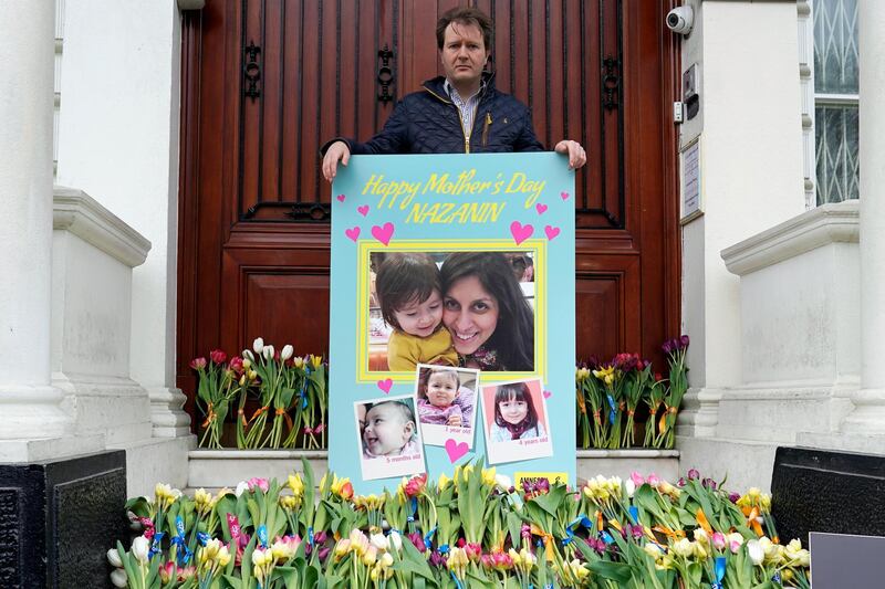 epa07476100 Richard Ratcliffe, the husband of the jailed UK-Iranian woman Nazanin Zaghari-Ratcliffe, delivers a mothers day card and flowers to the Iranian Embassy in Knightsbridge, London, Britain, 31 March 2019. Nazanin Zaghari-Ratcliffe was arrested in Iran on spying charges in April 2016.  EPA/WILL OLIVER
