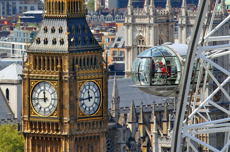 A view of the Houses of Parliament and the London Eye. Britain’s capital has overtaken Paris as the world’s most popular city among tourists. Dan Kitwood / Getty Images

