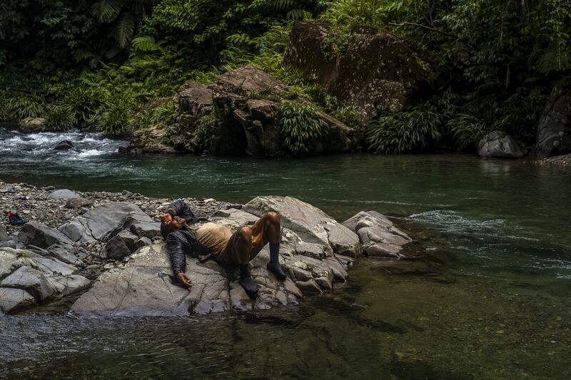 A photo by photographer Federico Rios Escobar showing a migrant resting while trekking from Colombia to Panama has been shortlisted for a prize at the V&A Museum in London. Photo: Federico Rios Escobar