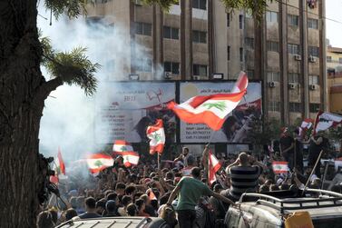 Protesters in Nabatieh wave flags flags during a recent afternoon protest. William Lowry/ The National