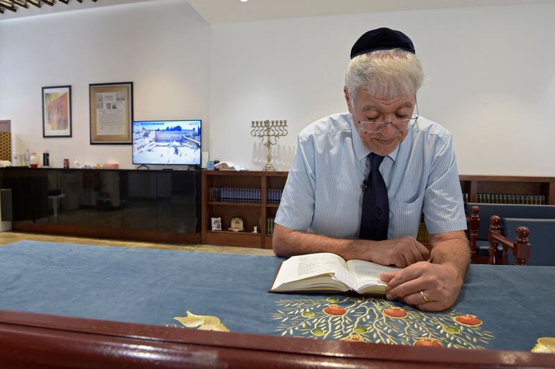 Ebrahim Nonoo, the head of the Jewish Community in Bahrain, prays at the recently renovated House of Ten Commandments synagogue in Manama. AFP