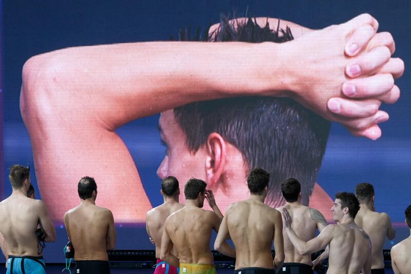 Swimmers await the judge's ruling at the end of the Men's 4 x 50m Medley Final at the LEN European Short Course Swimming Championships 2019 in Glasgow, Scotland.  EPA