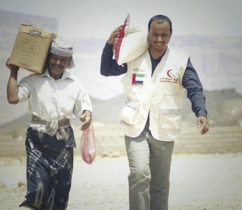 Emirates Red Crescent distributes emergency food aid in the Shabwa Governorate of Yemen on Monday. Wam