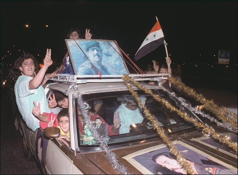 Iraqis in Baghdad celebrate the  ceasefire between Iraq and Iran on August 20, 1988. AFP