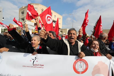A protest organised by The Defence Committee for the Martyrs Chokri Belaid and Mohamed Brahmi near the house of Ennahda's leader in 2022. EPA