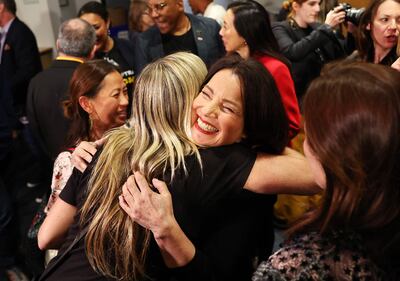 Sag-Aftra president Fran Drescher hugs a fellow member at an event to discuss their strike-ending deal with the Hollywood studios. Getty Images