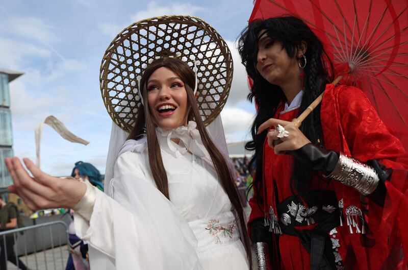 Cosplayers as anime characters. AFP