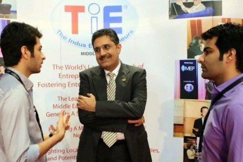 Prashant Gulati, right, the mentoring director and past president of the Middle East chapter of TiE, at Gitex. Ravindranath K / The National