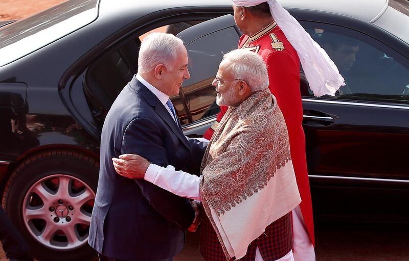 Israeli Prime Minister Benjamin Netanyahu shakes hands with his Indian counterpart Narendra Modi at his ceremonial reception in New Delhi, India, January 15, 2018. REUTERS/Adnan Abidi