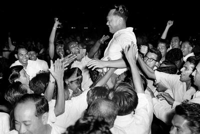 Lee Kuan Yew is hoisted by supporters after leading his People’s Action Party to a landslide victory in the elections in Singapore in the 1960s. AP Photo