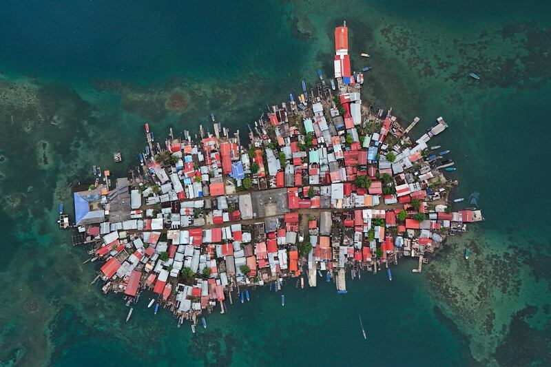 Buildings cover Gardi Sugdub Island, part of the San Blas archipelago off Panama's Caribbean coast. About 300 Guna Indigenous families are set to relocate to new homes, built by the government, on the mainland. AP