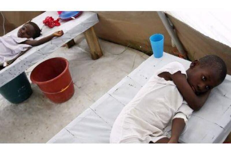 More than 5,000 Haitians have died in a cholera outbreak that followed last year's earthquake.