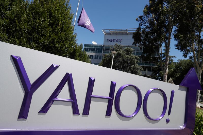 This Tuesday, July 19, 2016, photo shows a Yahoo sign at the company's headquarters in Sunnyvale, Calif. On Tuesday, Oct. 3, 2017, Yahoo tripled down on what was already the largest data breach in history, saying it affected all 3 billion of its users, not the 1 billion it revealed in late 2016. (AP Photo/Marcio Jose Sanchez)