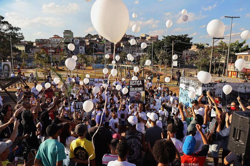Hundreds of people gather in a silent march in honour of the teenager who was allegedly killed by police in the area of Vila Clara, where the young man lived, in Sao Paulo, Brazil.  EPA