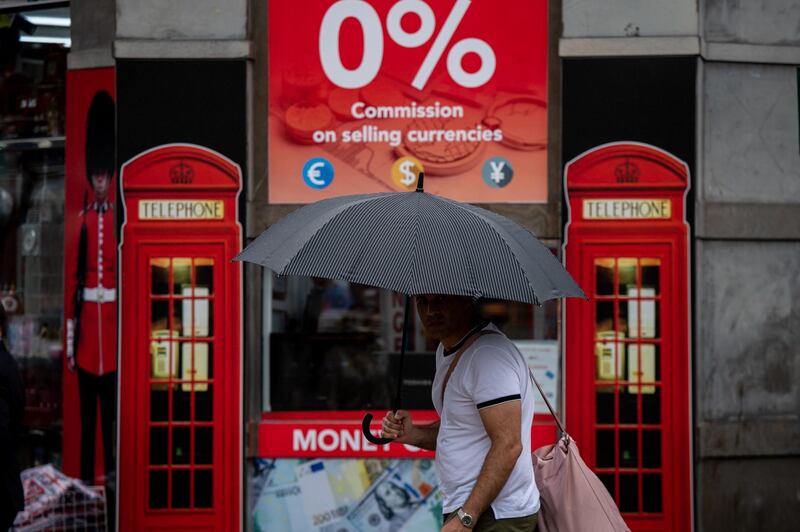 LONDON, ENGLAND - JULY 30: A man walks past a bureau de change on Oxford Street as British Pound Sterling has slumped to a 28-month low on July 30, 2019 in London, England. Sterling dropped below $1.23 against the US dollar and fell sharply against the euro to below 1.10 on the international currency markets on Monday, as cabinet ministers began meetings to prepare for a no-deal Brexit. (Photo by Chris J Ratcliffe/Getty Images)