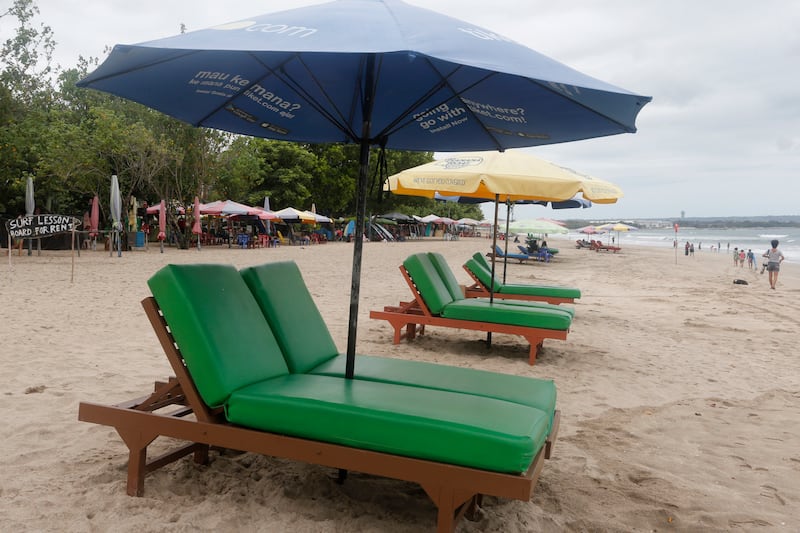 Empty sun chairs at Kuta beach, on the ever-popular holiday hotspot Bali. AP Photo