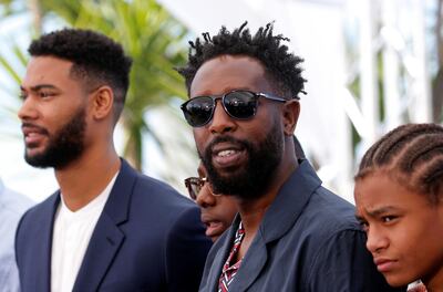 72nd Cannes Film Festival - Photocall for the film "Les Miserables" in competition - Cannes, France, May 16, 2019. Director Ladj Ly and cast members Djibril Zonga and Issa Perica pose during a photocall for the film "Les Miserables" in competition. REUTERS/Stephane Mahe