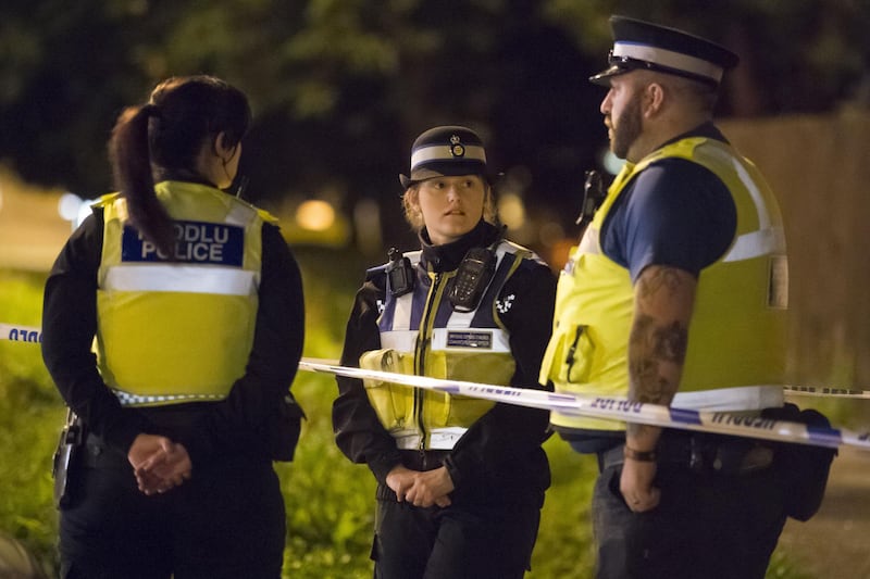 NEWPORT, WALES - SEPTEMBER 20: Police officers stand behind a cordon on Jeffrey Street on September 20, 2017 in Newport, Wales. Scotland Yard have said that a 25-year-old was arrested in Newport, Wales on Tuesday evening, the third arrest related to Friday's Tube attack in Parsons Green. (Photo by Matthew Horwood/Getty Images)