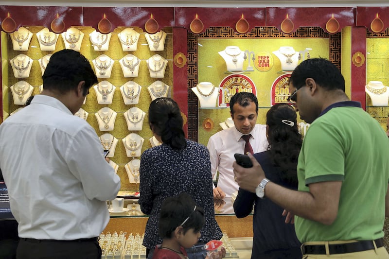 DUBAI , UNITED ARAB EMIRATES , OCT 17   – 2017 :- People buying jewellery for the Diwali festival at the Joyalukkas jewellery shop in Bur Dubai in Dubai.  (Pawan Singh / The National) 