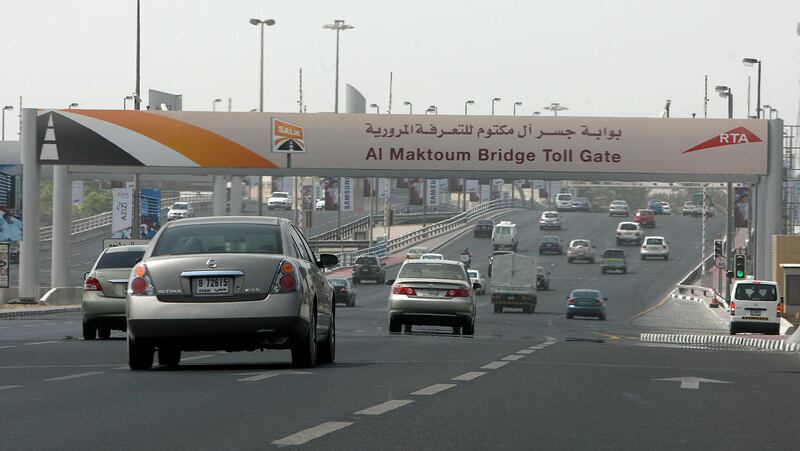 DUBAI, UNITED ARAB EMIRATES- Sep 9: Traffic flow was normal in the morning at  Al Maktoum bridge toll gate in Dubai. ( Pawan Singh / The National ) *** Local Caption ***  PS006- TRAFFIC.jpgPS006- TRAFFIC.jpg