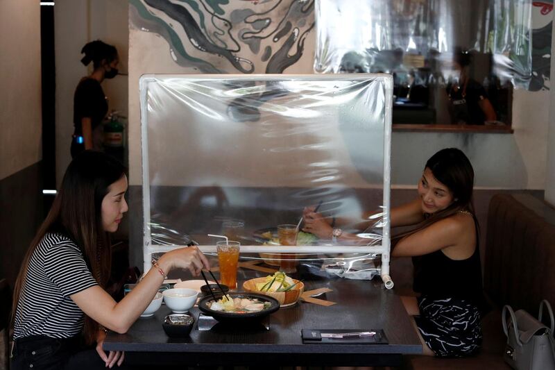 People have lunch in a Taiwanese hot pot style restaurant in Bangkok, Thailand. Reuters