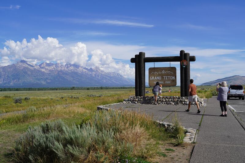 People take pictures at Grand Teton National Park, outside  Jackson. Willy Lowry / The National