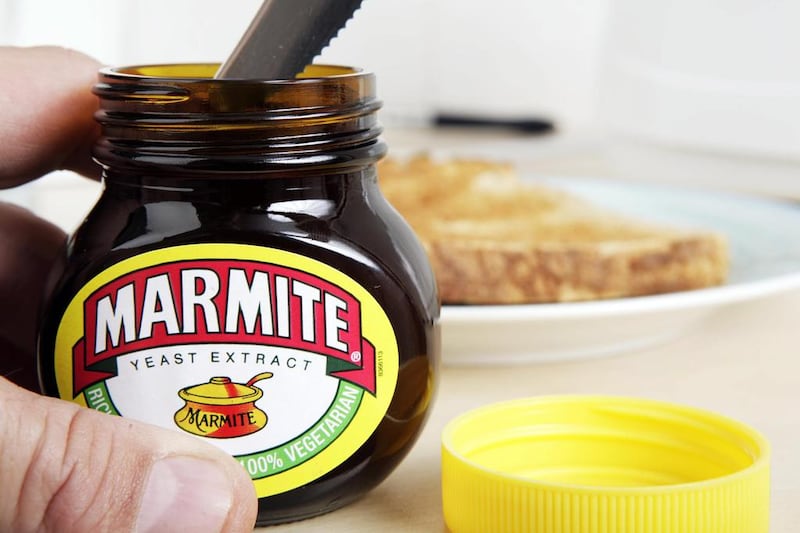 The popular yeast-extract spread Marmite has lent its distinctive flavour to a new range of hummus. Getty Images