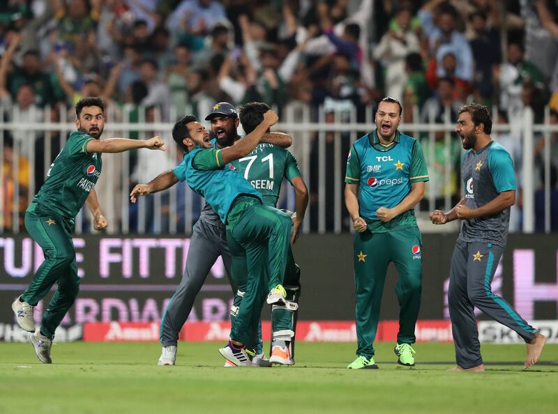 Pakistan's Naseem Shah celebrates with teammates after hitting the winning runs against Afghanistan. 