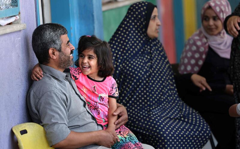 Palestinian Mansour Abu Ghadyan's family are among those living in an UNRWA school.  AFP