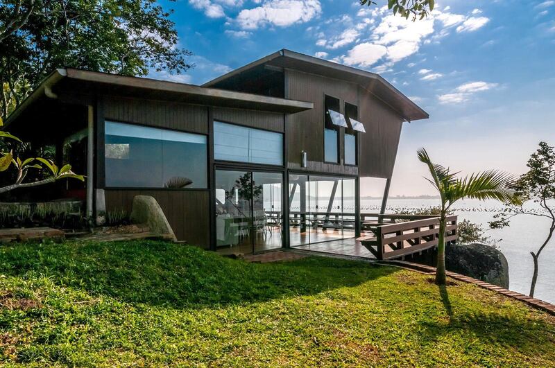 2. This boulder strewn stilted beach house in Brazil is the second-most wishlisted home on Airbnb.