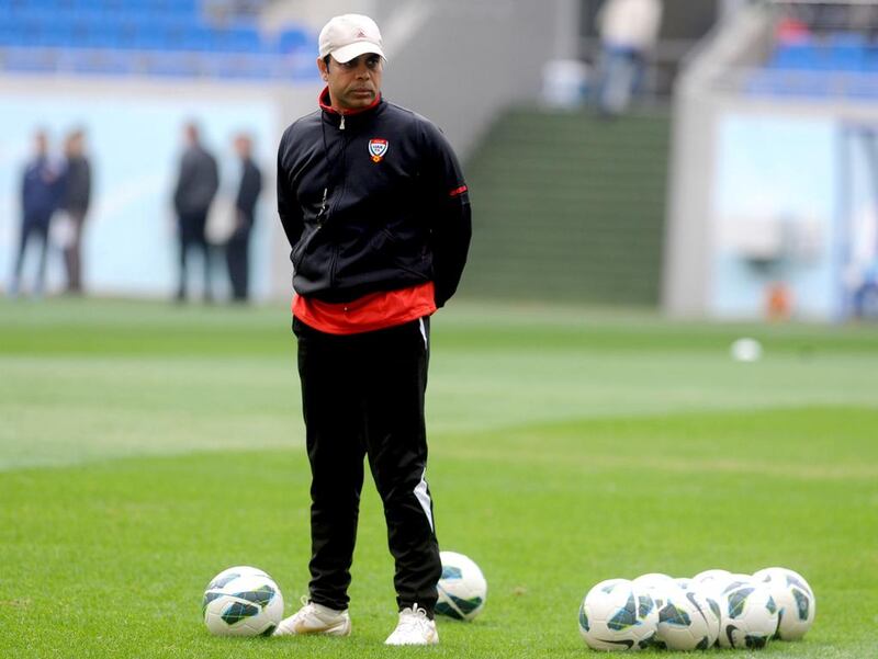 Mahdi Ali, the UAE head coach, watches his team train in Tashkent on Tuesday. Al Ittihad