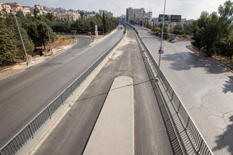 epa08813323 An empty highway during the lockdown in Amman, Jordan, 11 November 2020. Jordan authorities imposed a four days lockdown the night of the parliamentary elections voting day due to the rise of Covid-19 Coronavirus cases in the country and risk of big gathering resulting from eventual election wins celebrations. According to media reports, about 30 percent voters went to vote to elect 130 Members of Parliament or the next four years.  EPA/ANDRE PAIN