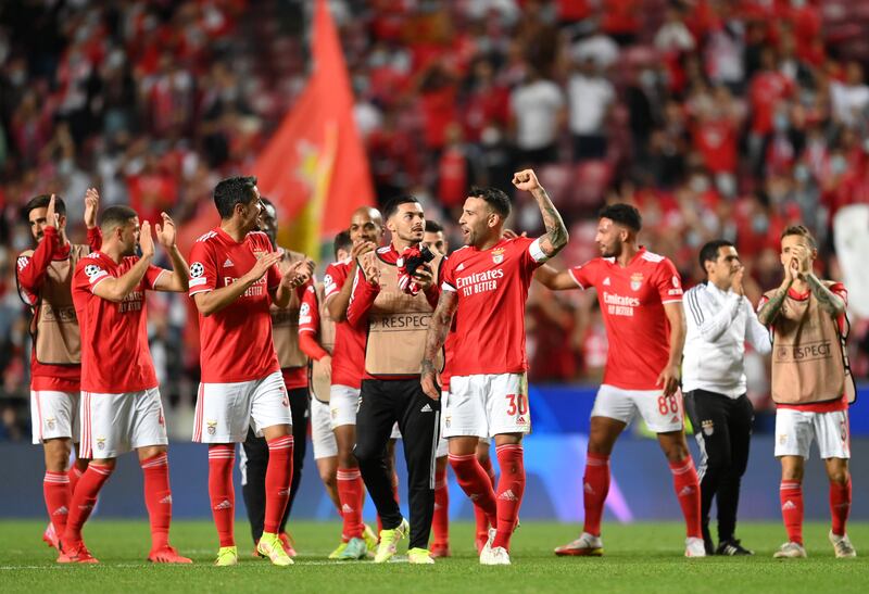 Benfica players celebrate after the match. Getty