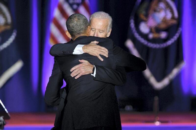 U.S. President Barack Obama, front, embraces U.S. Vice President Joe Biden after his farewell address in Chicago, Illinois, U.S., on Tuesday, Jan. 10, 2017. Obama blasted "zero-sum" politics as he drew a sharp contrast with his successor in his farewell address Tuesday night, acknowledging that despite his historic election eight years ago his vision for the country will exit the White House with him. Photographer: Christopher Dilts/Bloomberg via Getty Images