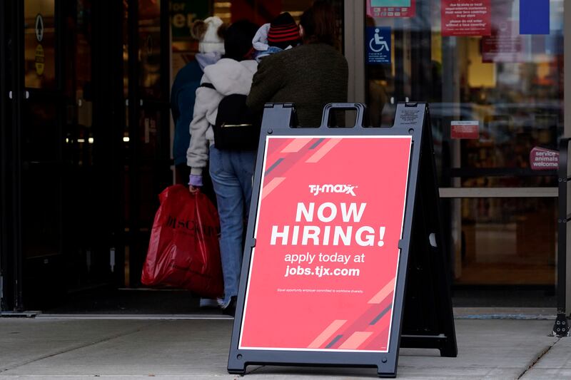 A hiring sign is displayed outside of a retail store in Vernon Hills, Illinois, as employers scramble to fill vacant posts. AP